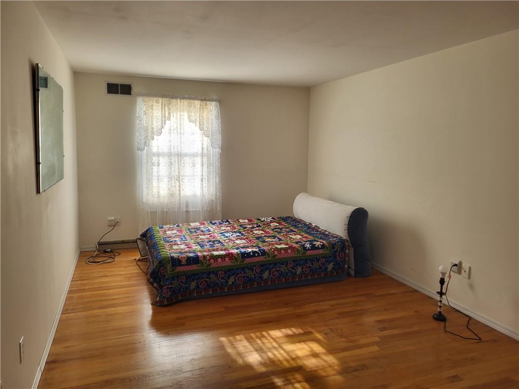 117 Farmington Drive Butler, PA 16001 - Photo 13 of 36 Large Primary Bedroom With Hardwood Floor