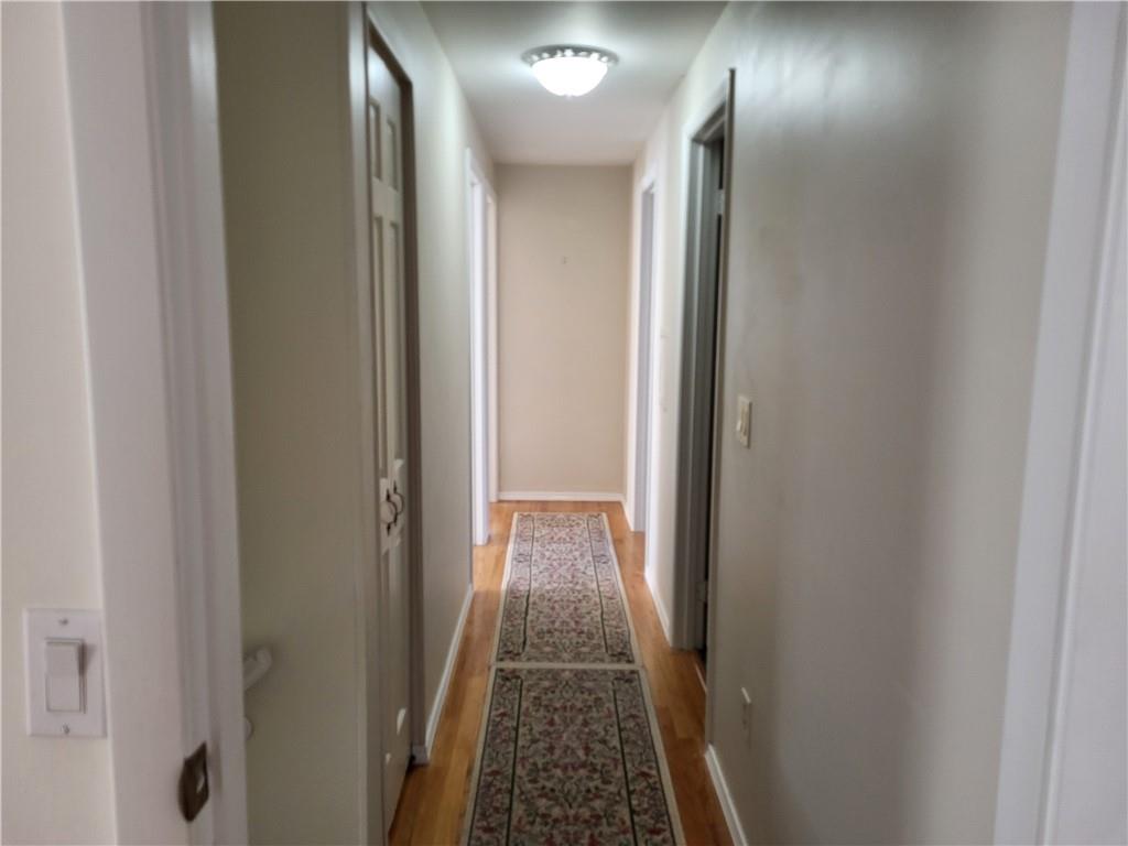 117 Farmington Drive Butler, PA 16001 - Photo 18 of 36 Upper Level Hallway Leading to a Linen Closet, the Three Other Bedrooms, and Main Bath