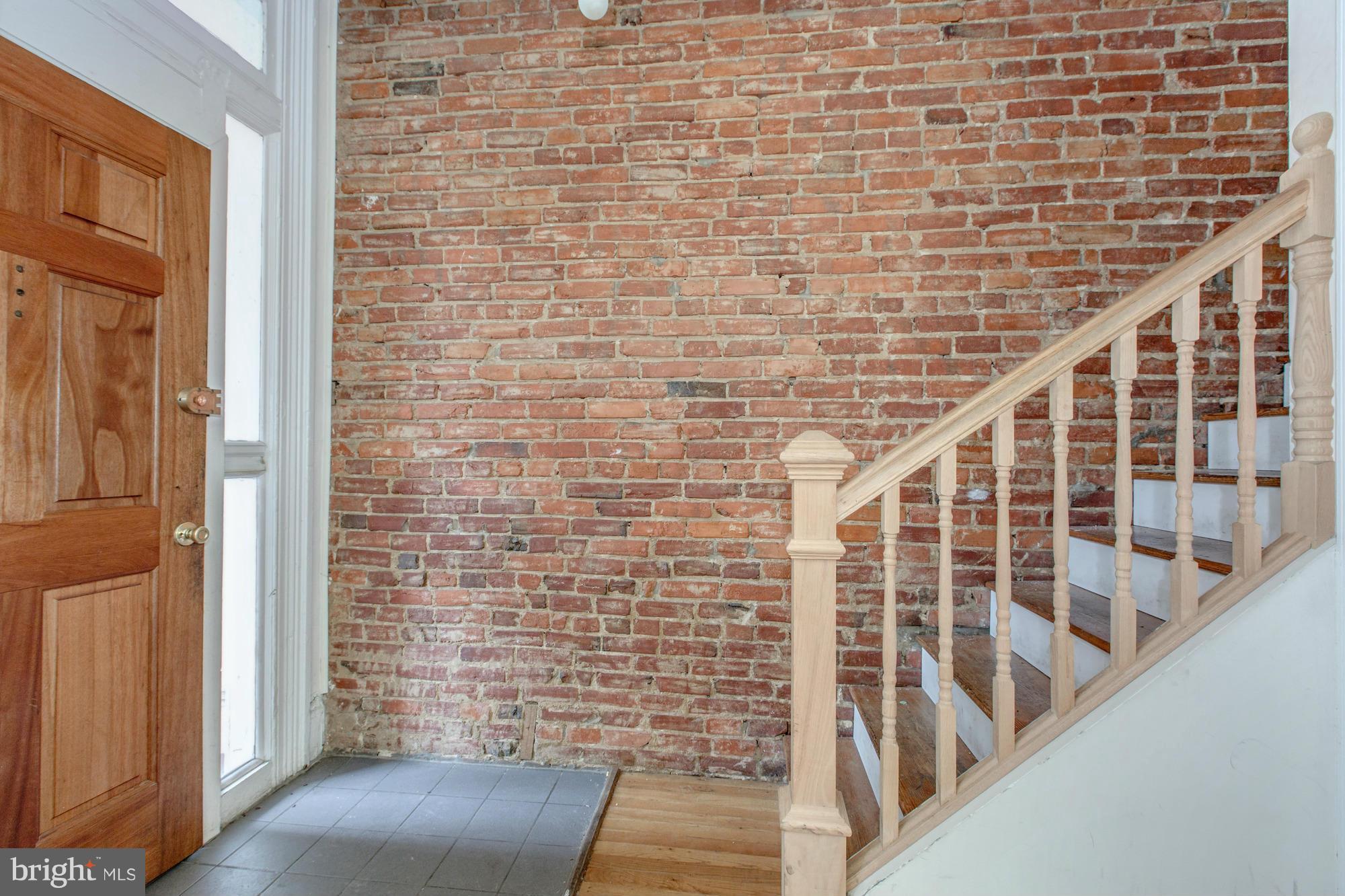 1305 Q Street Northwest Washington, DC 20009 - Photo 3 of 23 Gorgeous exposed brick on exterior stair wall