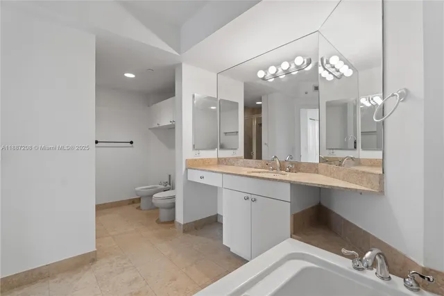 a view of an empty room with glass door