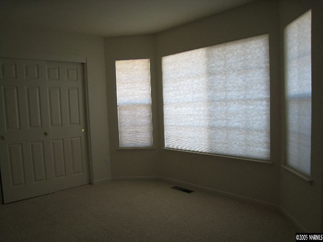 4522 Goodwin Road Sparks, NV 89436 - Photo 9 of 9 a view of an empty room with a window