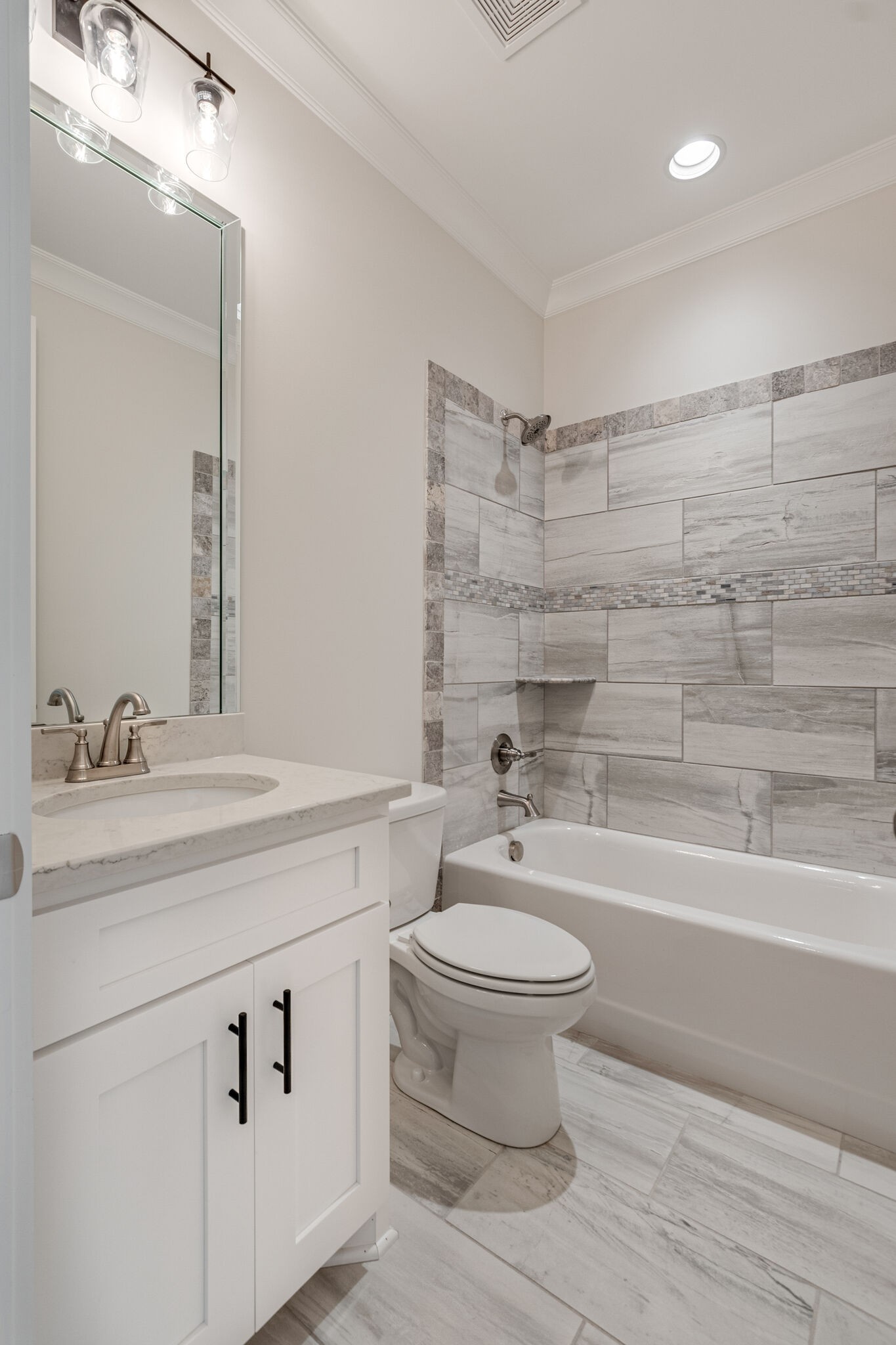 12599 North Milton Road Milton, TN 37118 - Photo 23 of 34 a bathroom with a double vanity sink and a bathtub