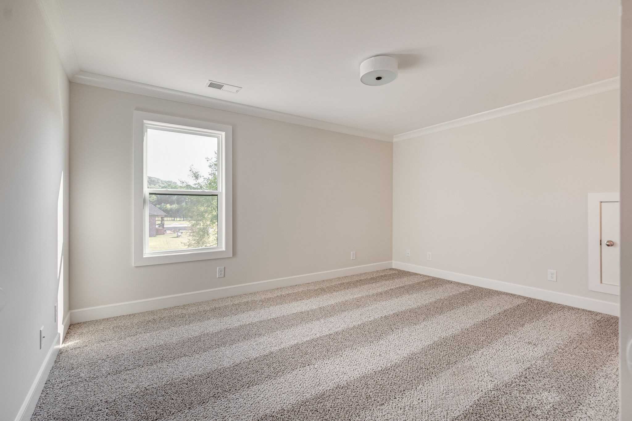 12599 North Milton Road Milton, TN 37118 - Photo 29 of 34 a view of an empty room with a window