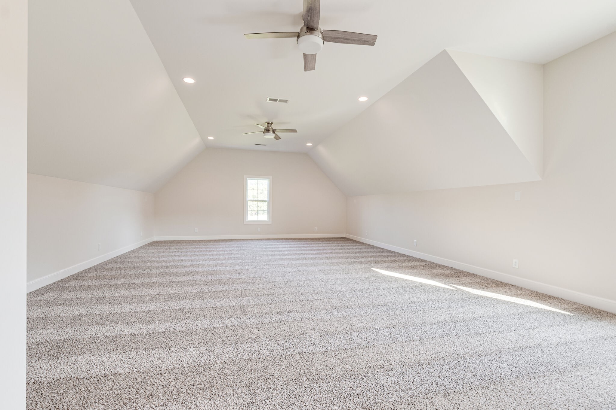 12599 North Milton Road Milton, TN 37118 - Photo 30 of 34 an empty room with windows and ceiling fan