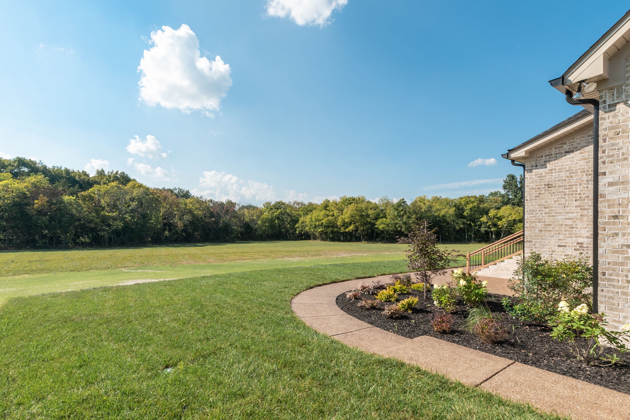 12599 North Milton Road Milton, TN 37118 - Photo 32 of 34 a view of a golf course with a lake