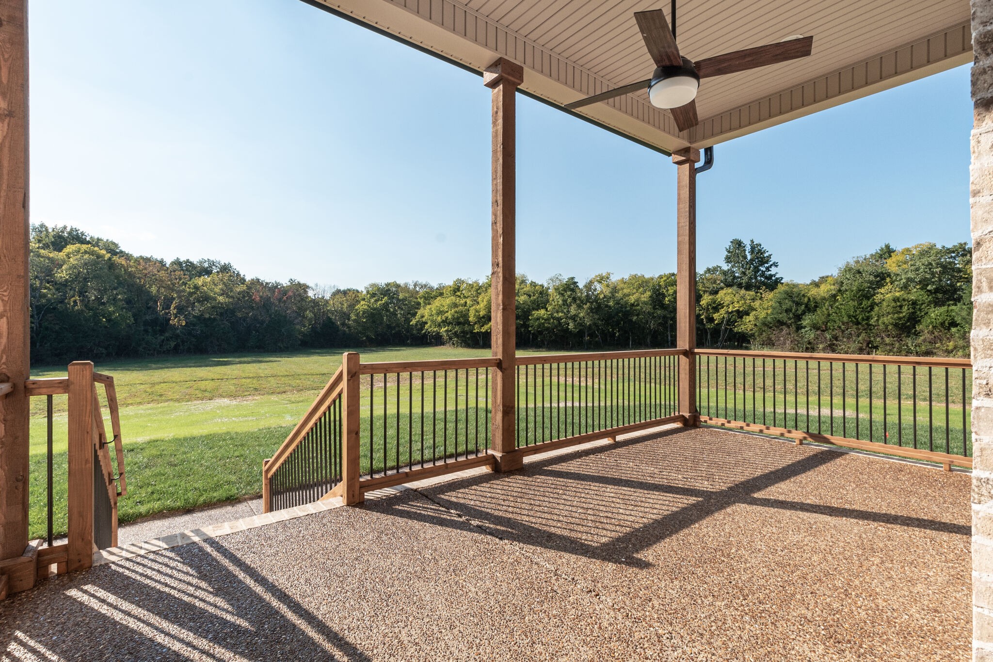 12599 North Milton Road Milton, TN 37118 - Photo 34 of 34 a view of a tennis court with a roof deck