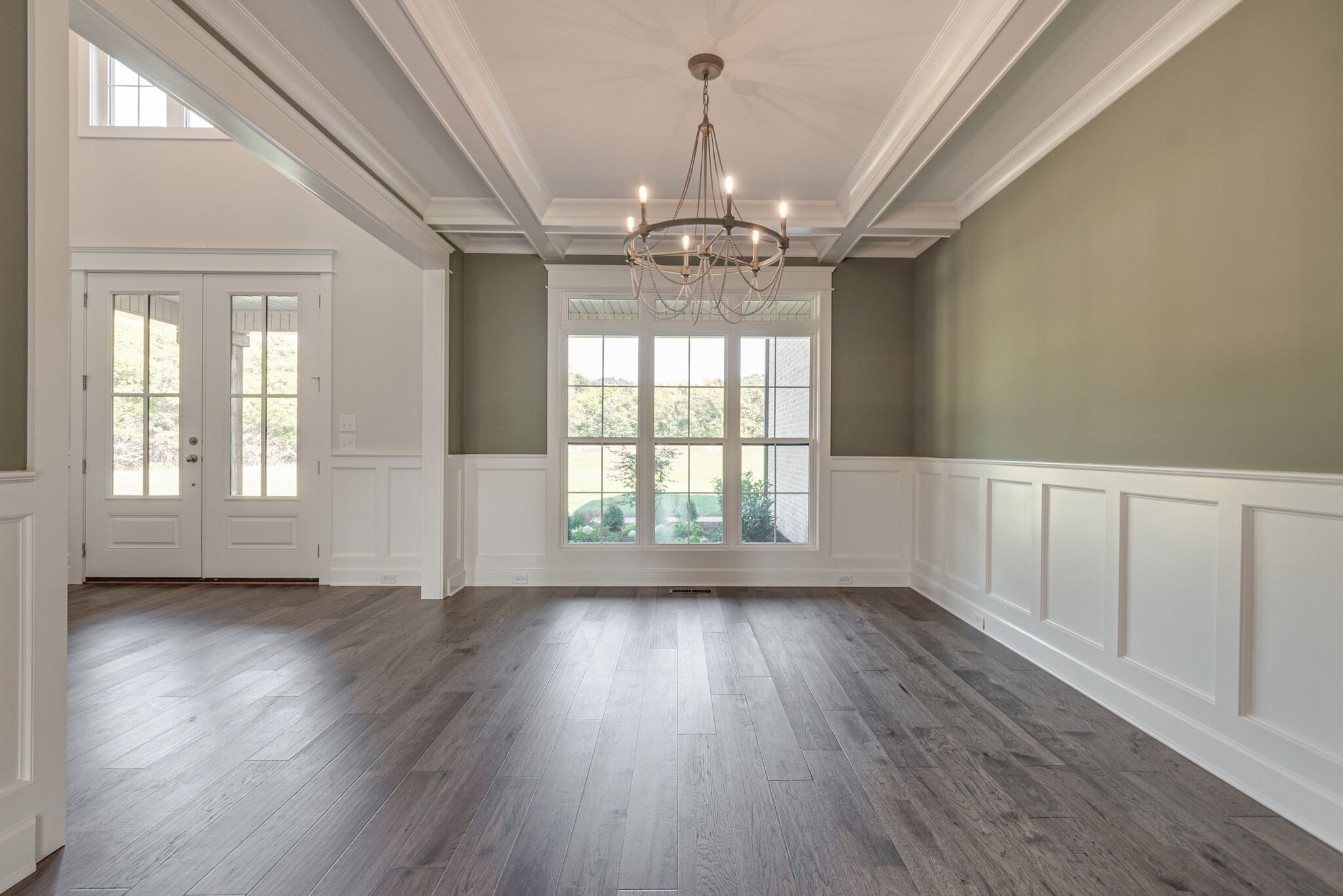 12599 North Milton Road Milton, TN 37118 - Photo 7 of 34 a view of an empty room with wooden floor and a window
