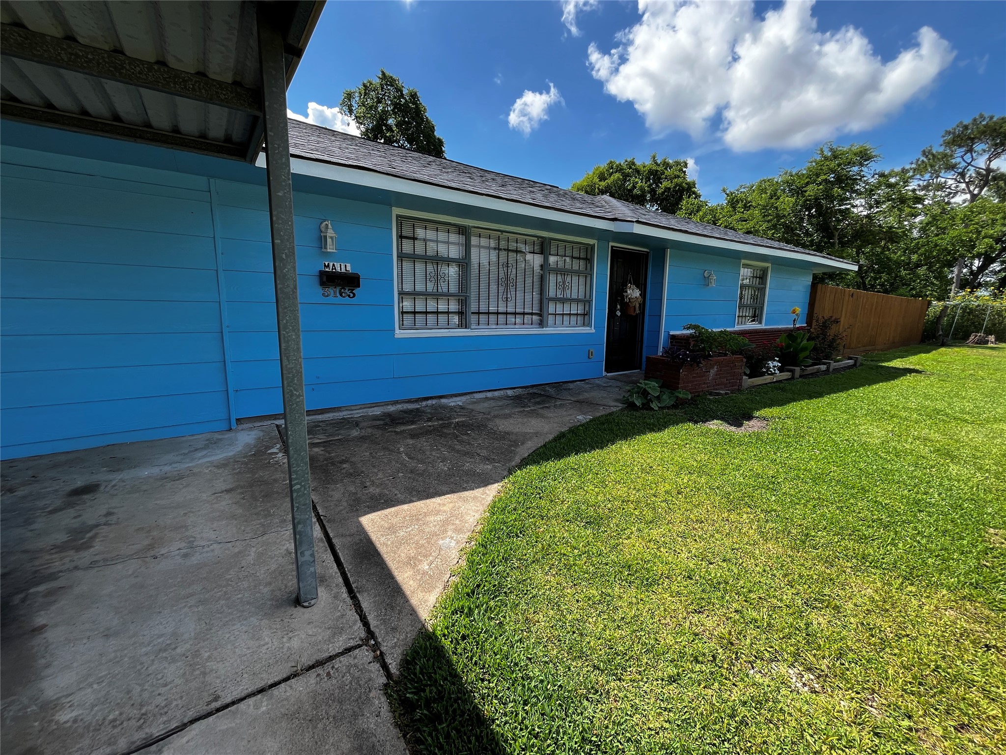 3163 Roe Drive Houston, TX 77087 - Photo 15 of 47 a view of a house with a back yard