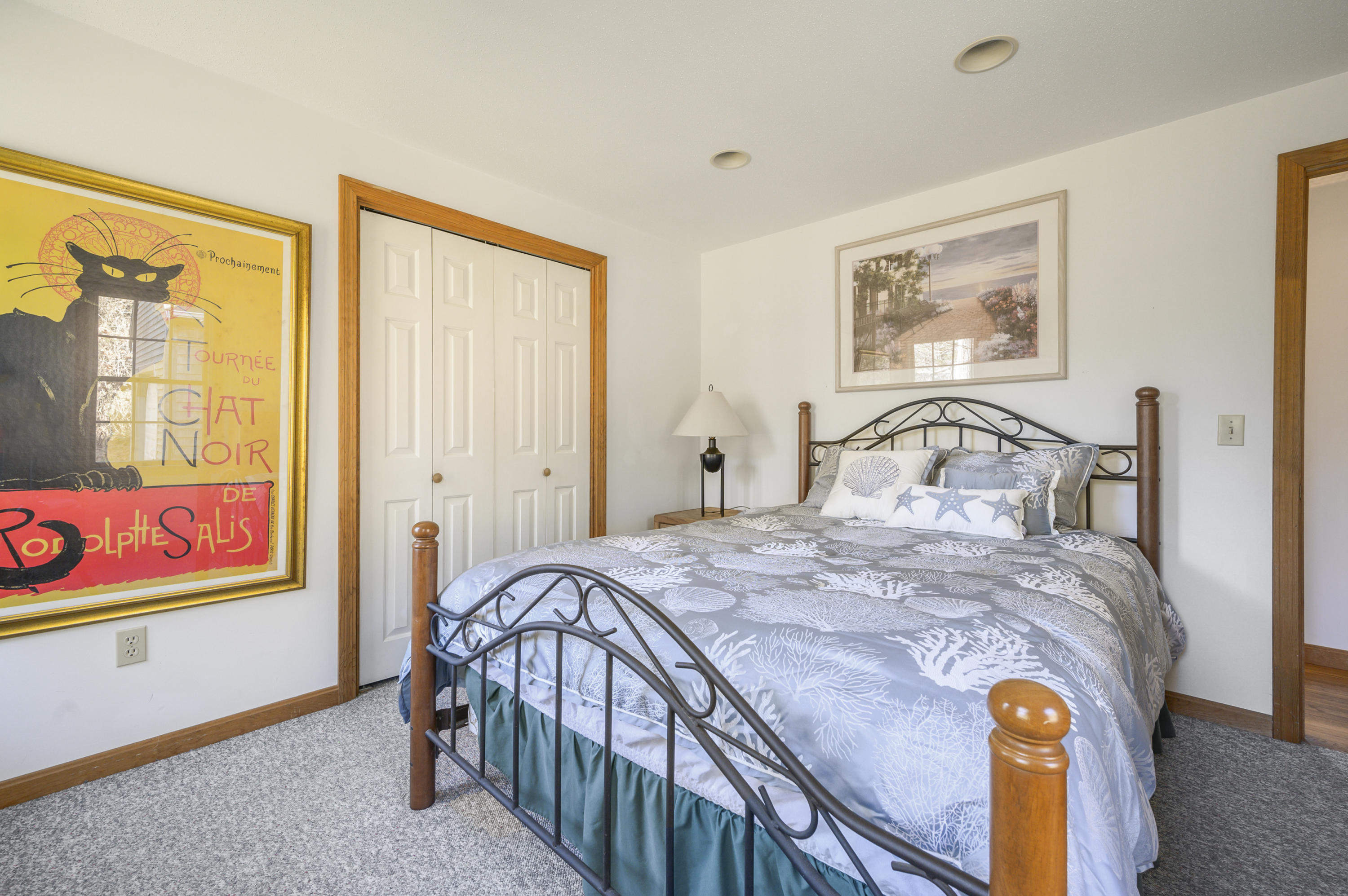 40 Pheasant Run Eastham, MA 02642 - Photo 15 of 20 a bedroom with a bed and wooden floor