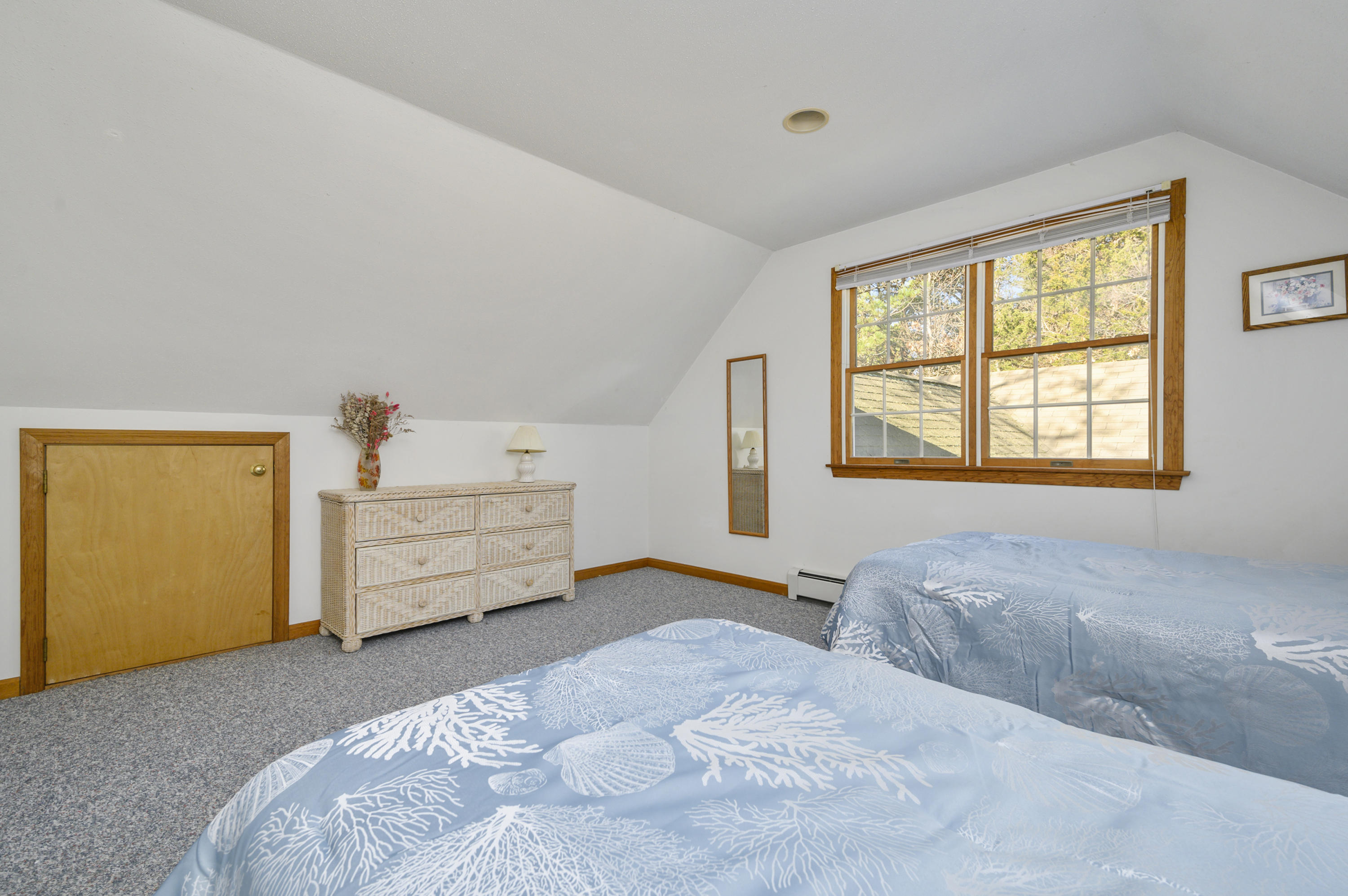 40 Pheasant Run Eastham, MA 02642 - Photo 20 of 20 a bedroom with a bed and a window