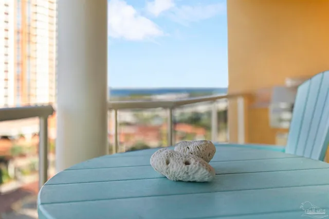 a view of city with ocean