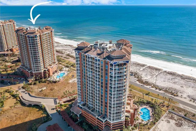 a view of city with ocean