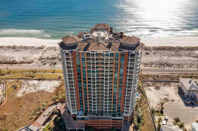 a view of city with ocean