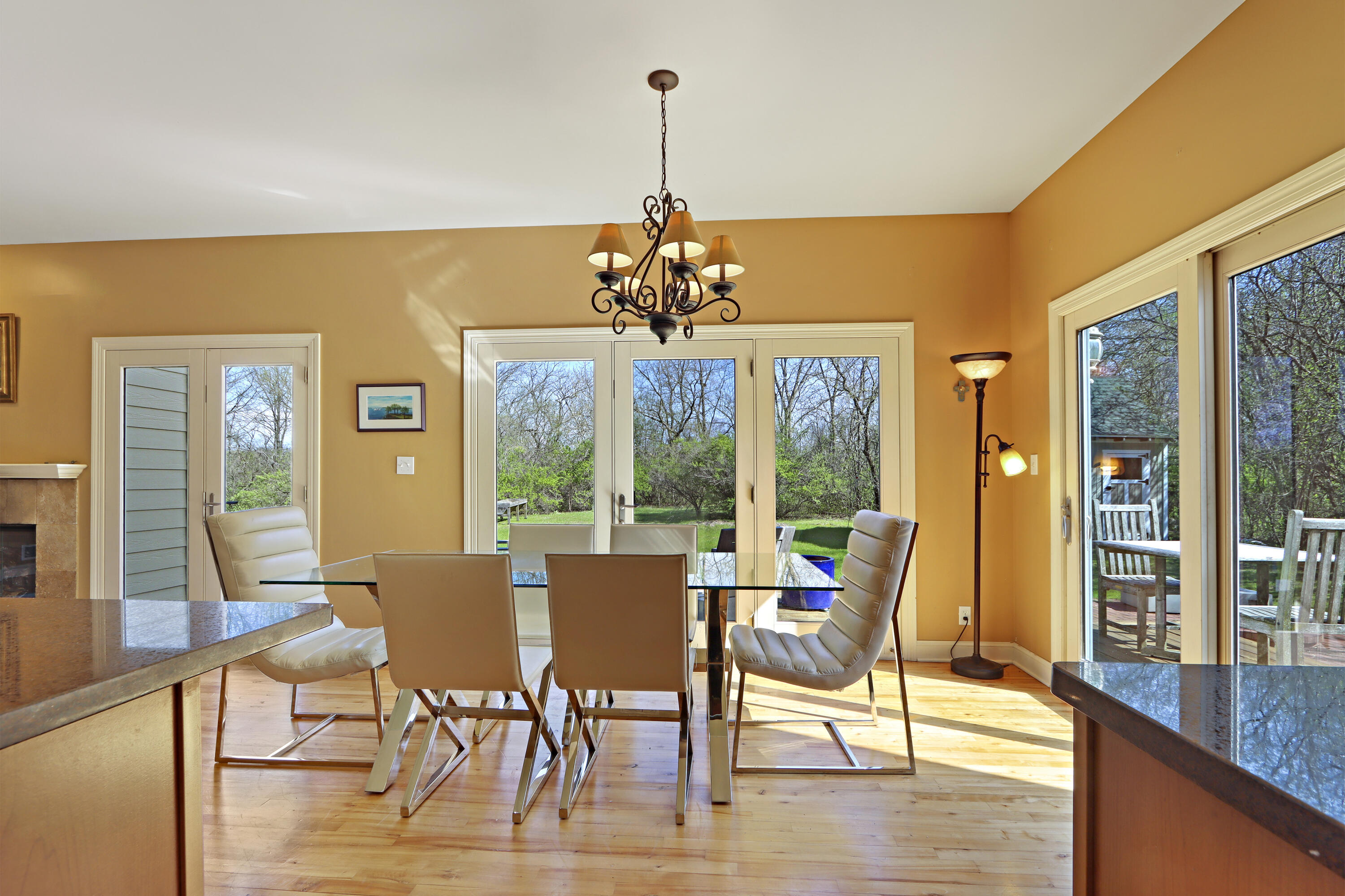 392 County Road B Fontana, WI 53125 - Photo 16 of 75 No need for al fresco dining when you are surrounded by views and back yard breezes in the Dinette