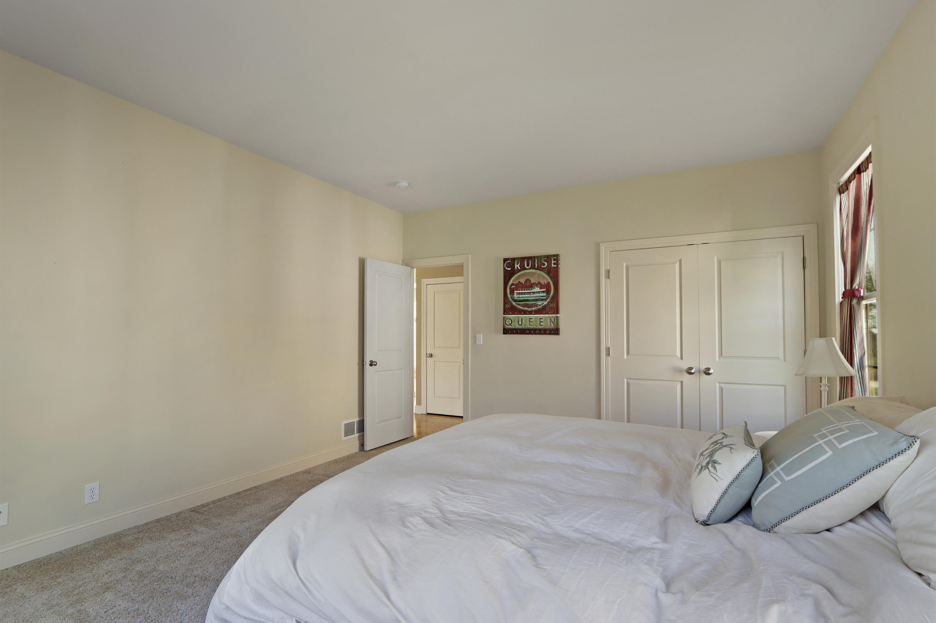 392 County Road B Fontana, WI 53125 - Photo 22 of 75 The ML bedroom is handy as a guest room or as a ML Primary BR if needed