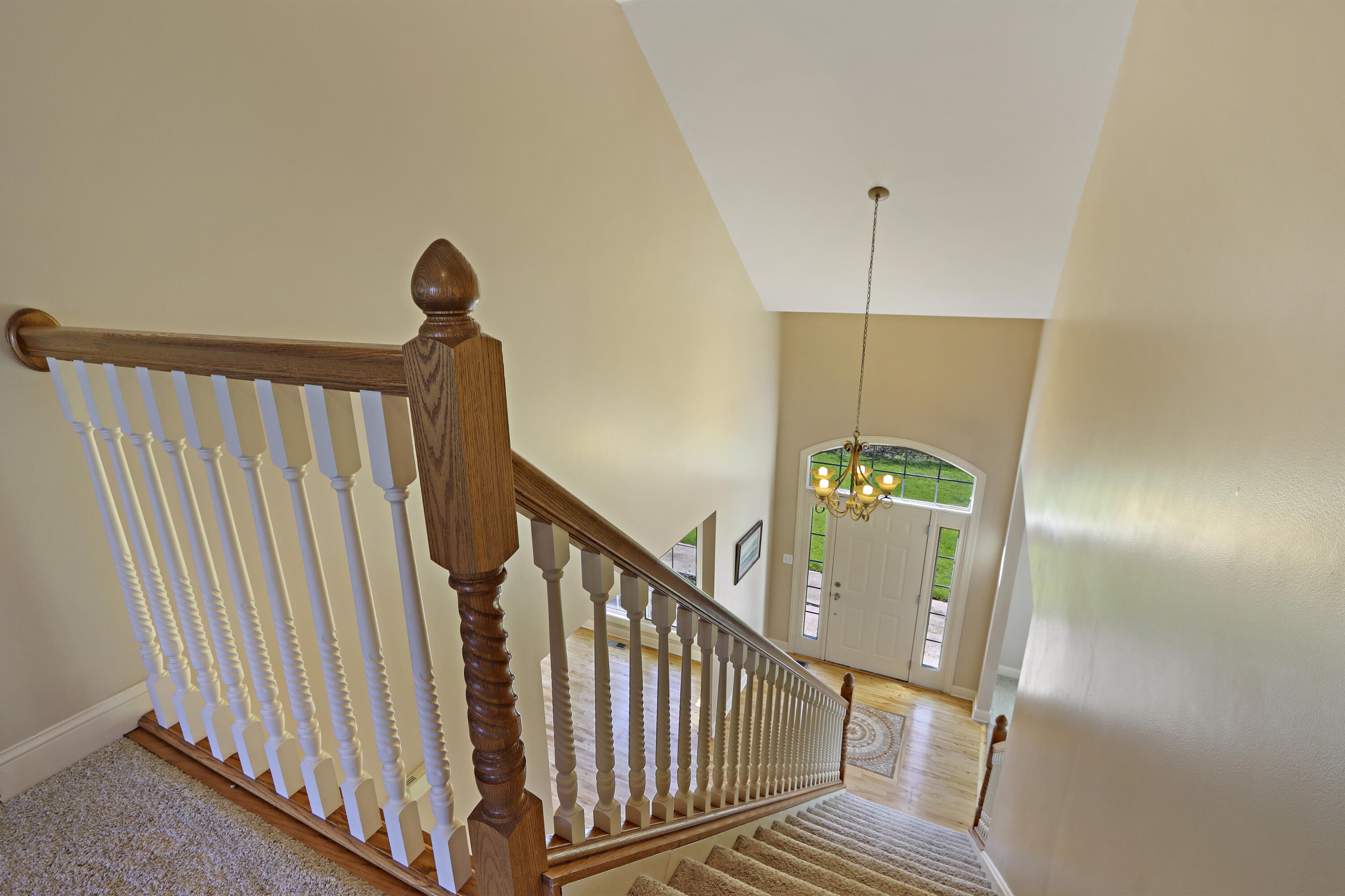 392 County Road B Fontana, WI 53125 - Photo 24 of 75 The 2-Story Entry is as dramatic and sunny from the UL as it is from the ML