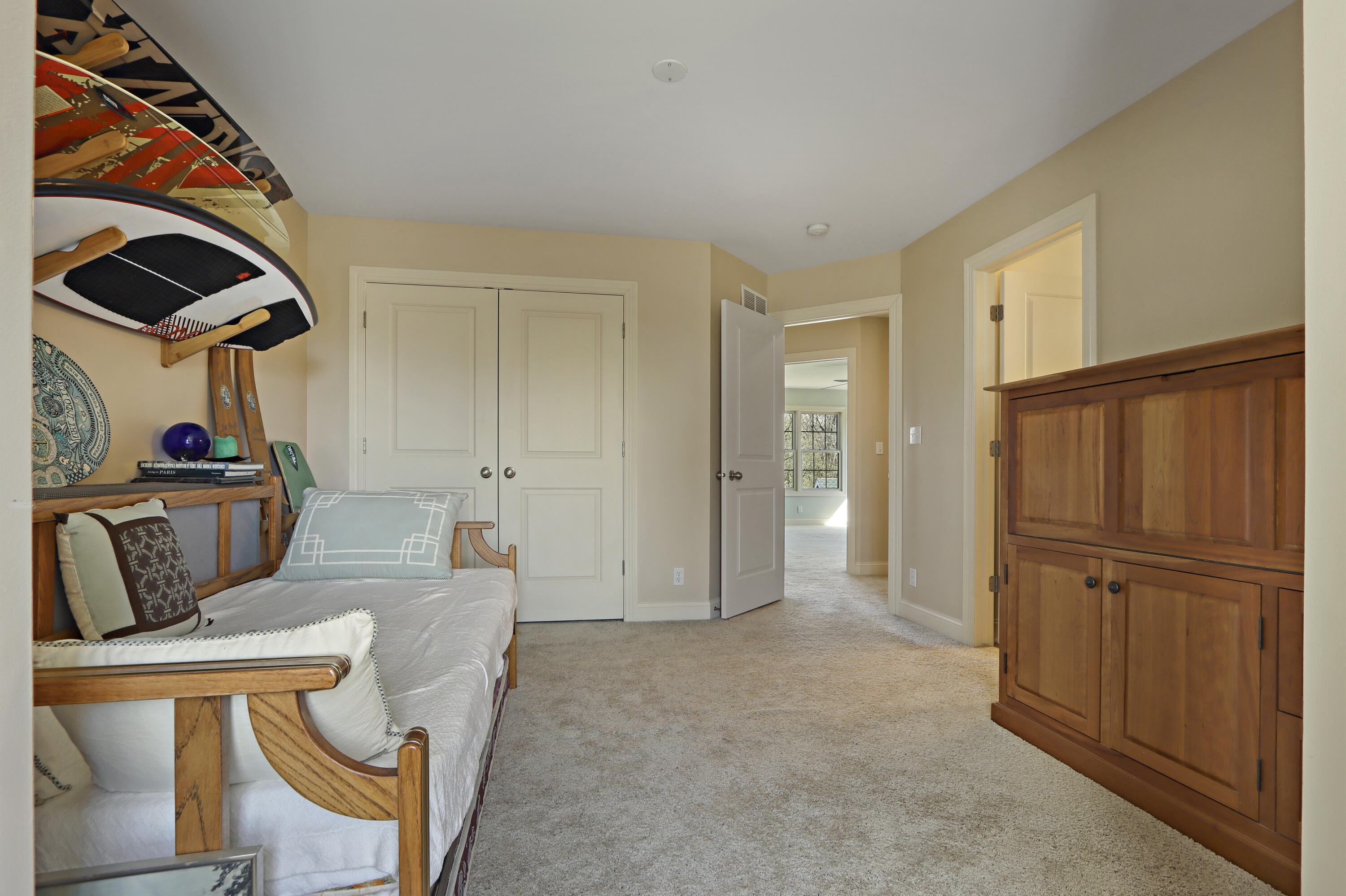 392 County Road B Fontana, WI 53125 - Photo 35 of 75 Bedroom 3 has an ensuite bathroom, spacious bedroom closet and a large storage closet just outside the bedroom