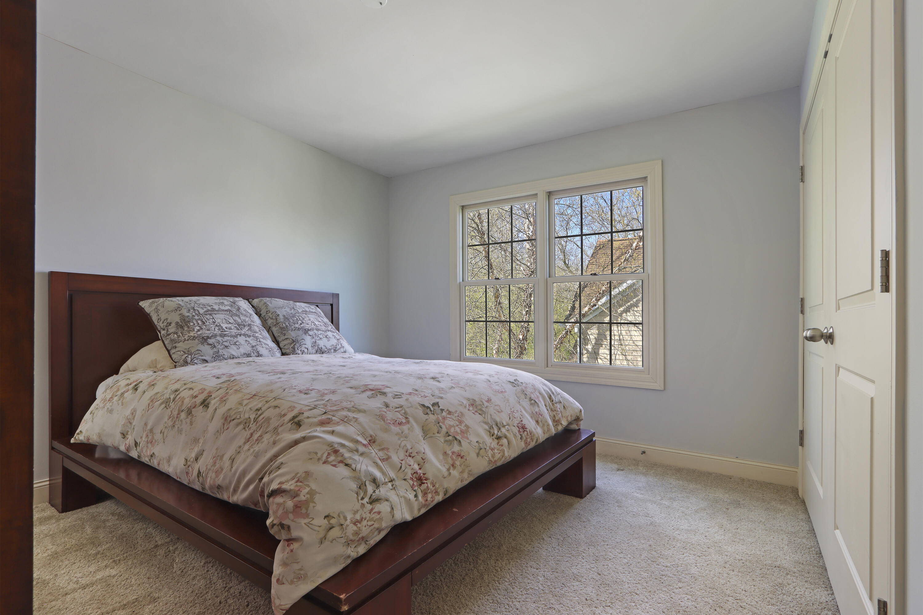 392 County Road B Fontana, WI 53125 - Photo 37 of 75 Bedroom 4 has western views