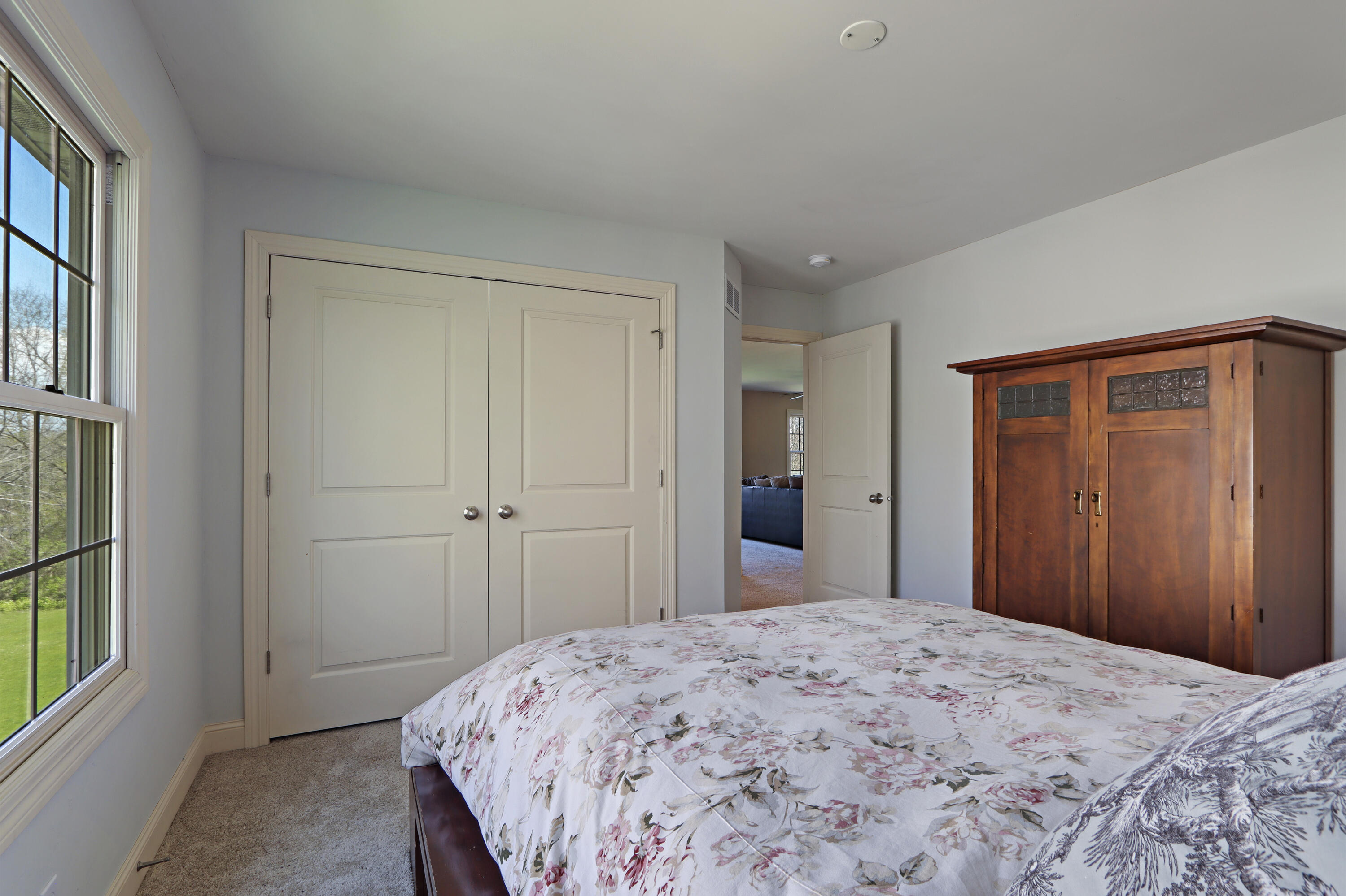 392 County Road B Fontana, WI 53125 - Photo 39 of 75 Bedroom 4 has a large closet and room for your favorite bedroom furniture
