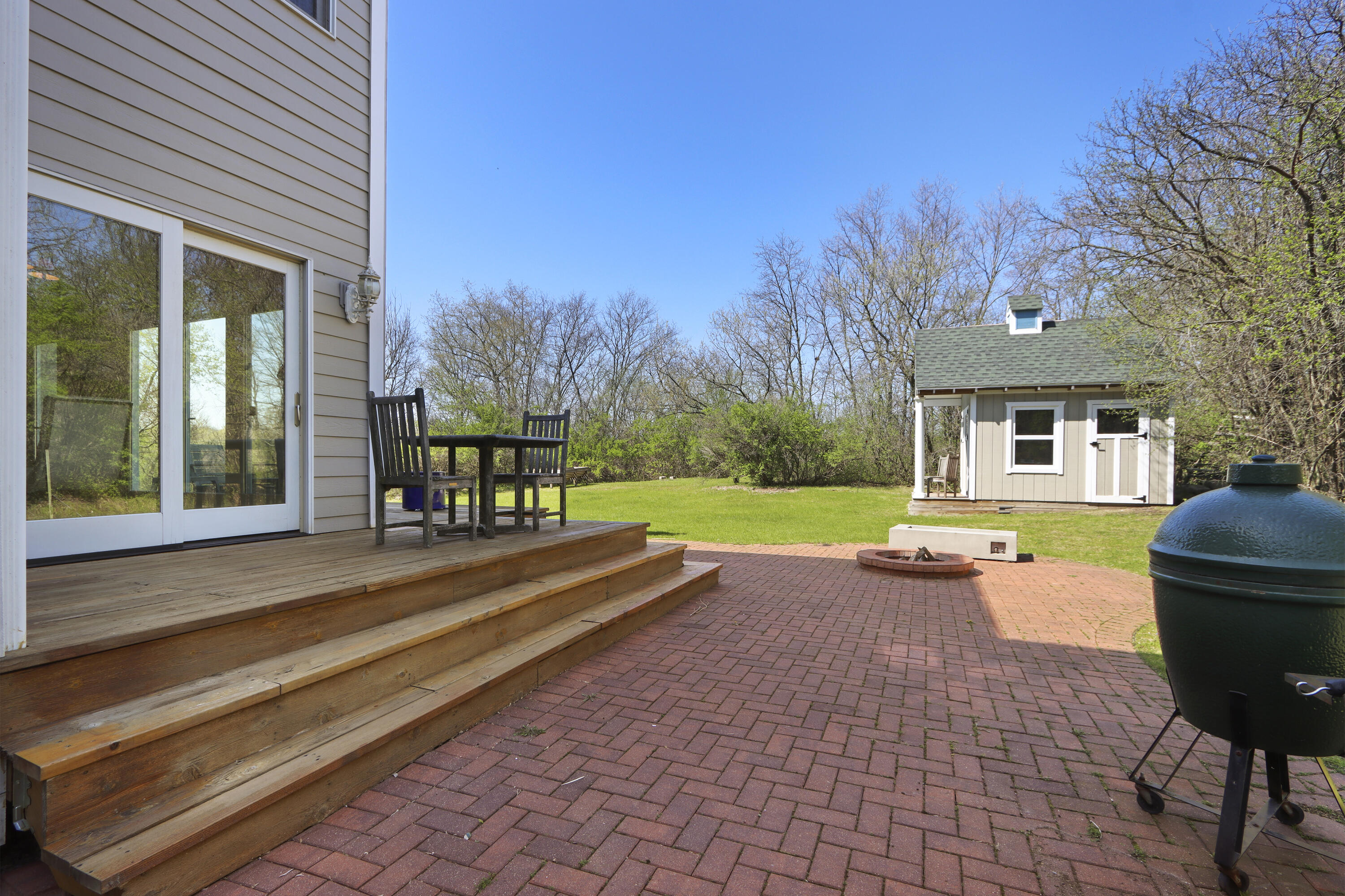 392 County Road B Fontana, WI 53125 - Photo 49 of 75 The dinette opens out to the deck and patio and is a great place to grill