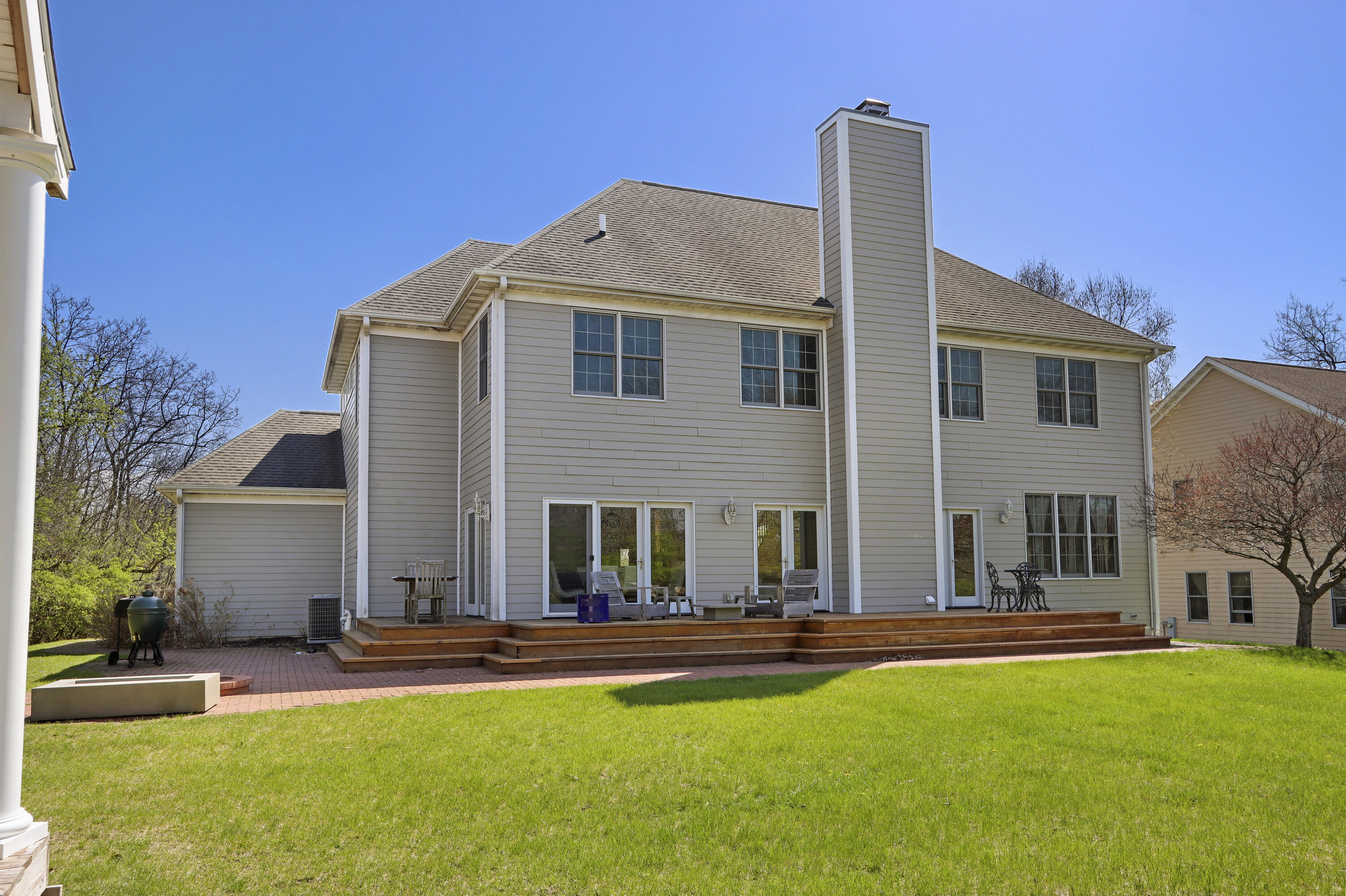 392 County Road B Fontana, WI 53125 - Photo 51 of 75 Imagine entertaining in the back yard on the deck and patio!