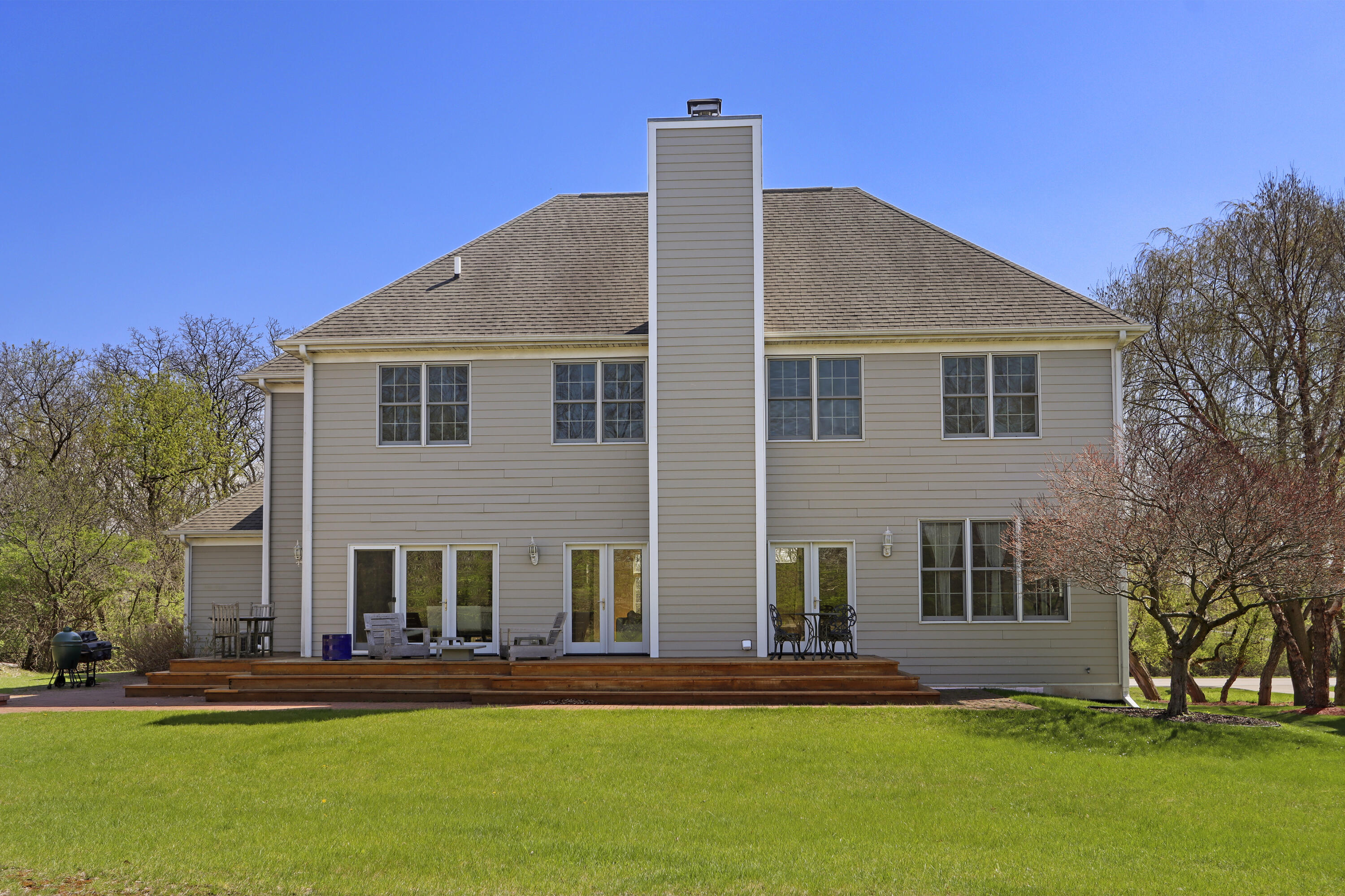 392 County Road B Fontana, WI 53125 - Photo 52 of 75 The Rear Exterior is simple yet majestic