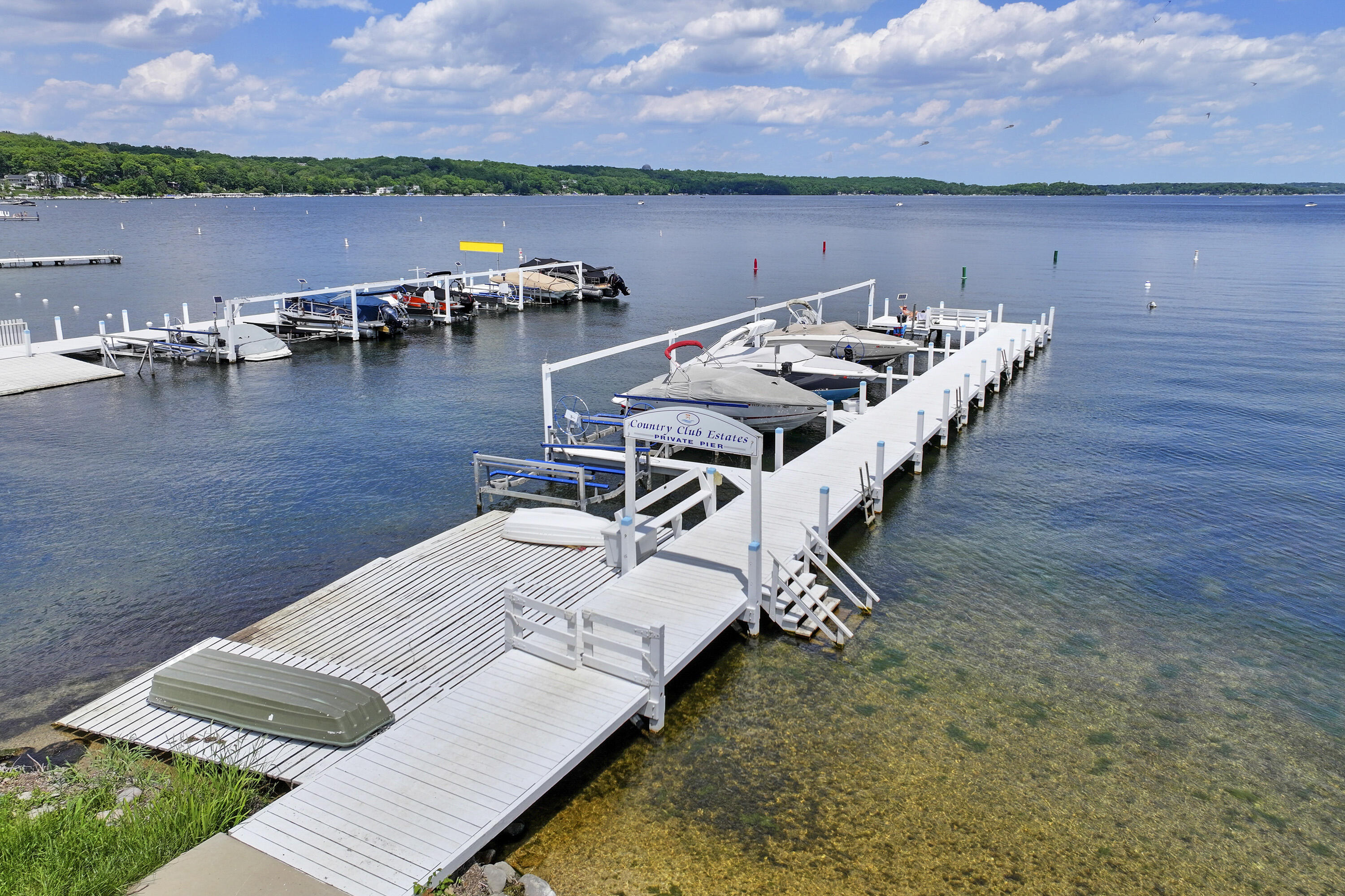 392 County Road B Fontana, WI 53125 - Photo 63 of 75 The CCE beach has a pier and raft and a Water Safety Patrol Lifeguard is on duty during the summer