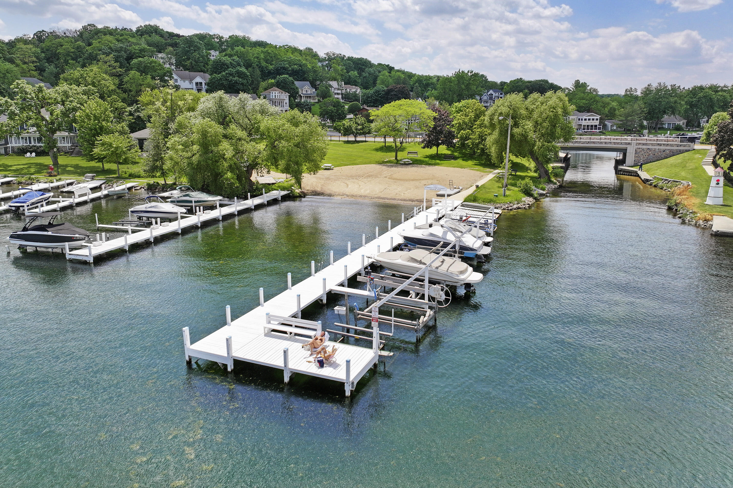 392 County Road B Fontana, WI 53125 - Photo 64 of 75 The end of the CCE pier is a great place to catch some sun, read or lake watch