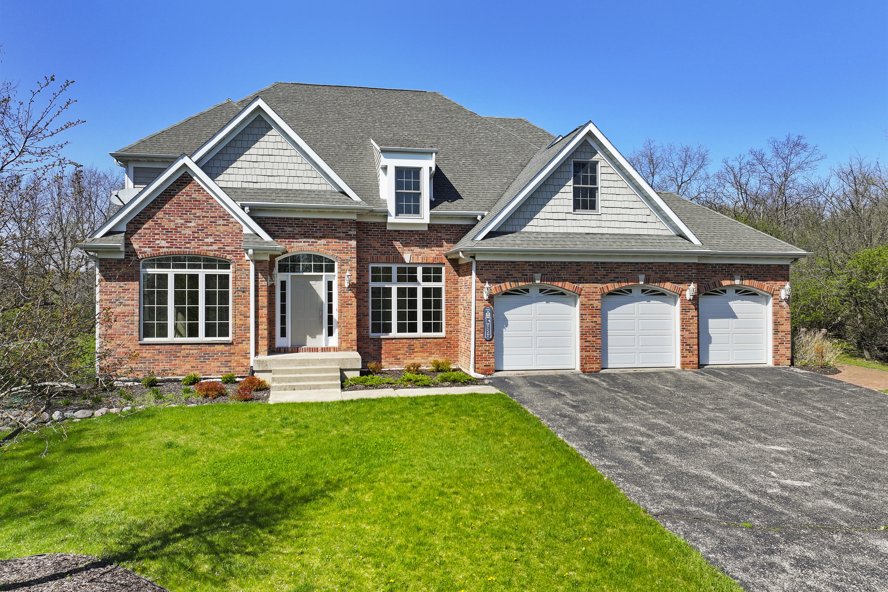 392 County Road B Fontana, WI 53125 - Photo 4 of 75 Welcome Home! This 5 BR, 4 Bath, 2-Story Contemporary Colonial home with 3 car garage is ready for its new owners and your new chapter!