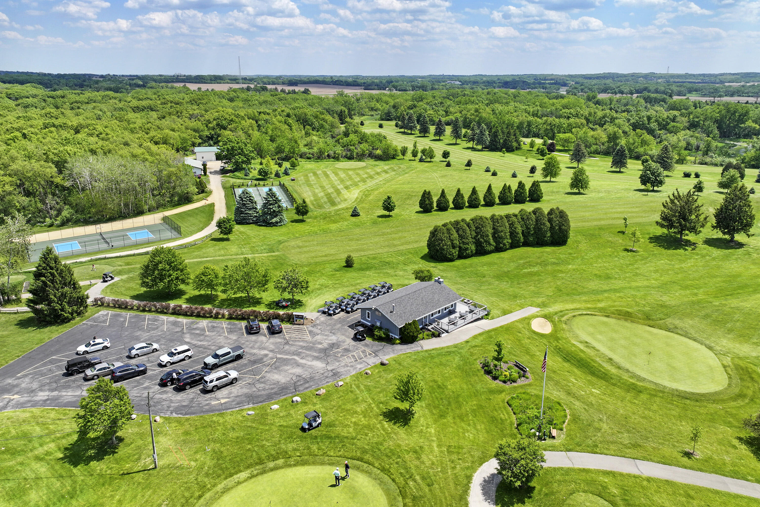 392 County Road B Fontana, WI 53125 - Photo 67 of 75 The CCE Golf Course has a clubhouse and parking for both vehicles and golf carts