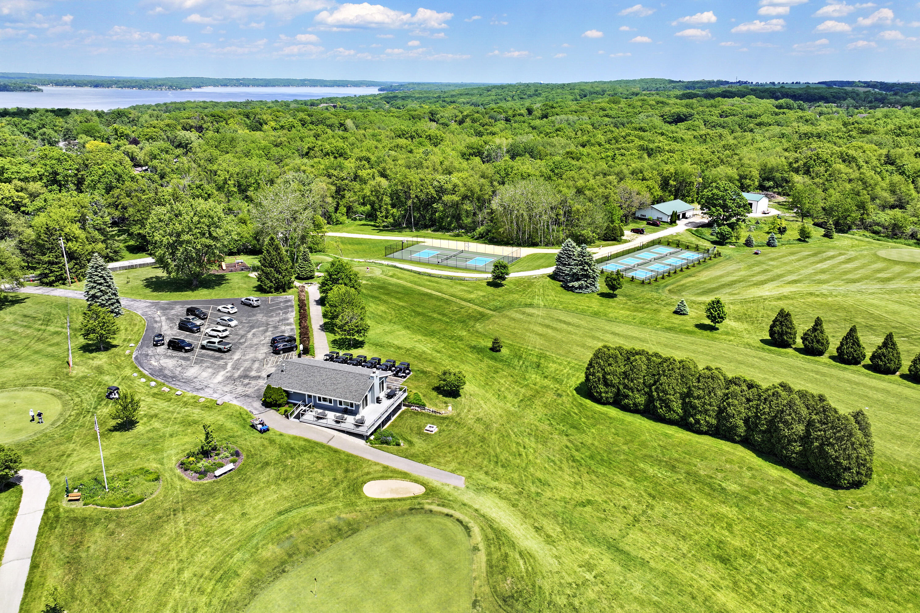 392 County Road B Fontana, WI 53125 - Photo 68 of 75 The Country Club Estates Golf Course is surrounded by woodlands with walking trails