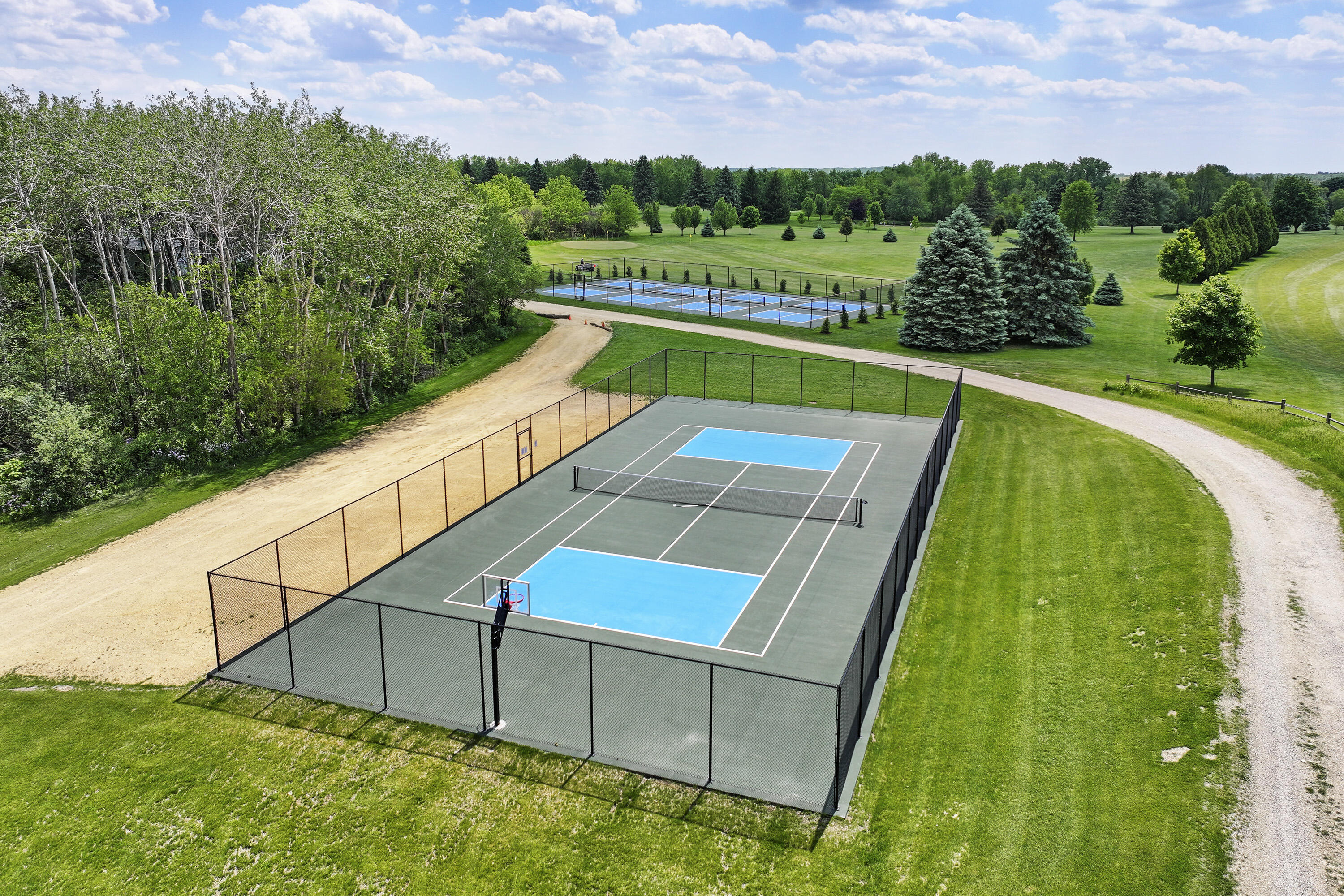 392 County Road B Fontana, WI 53125 - Photo 69 of 75 CCE added pickleball/racquet courts that are very popular