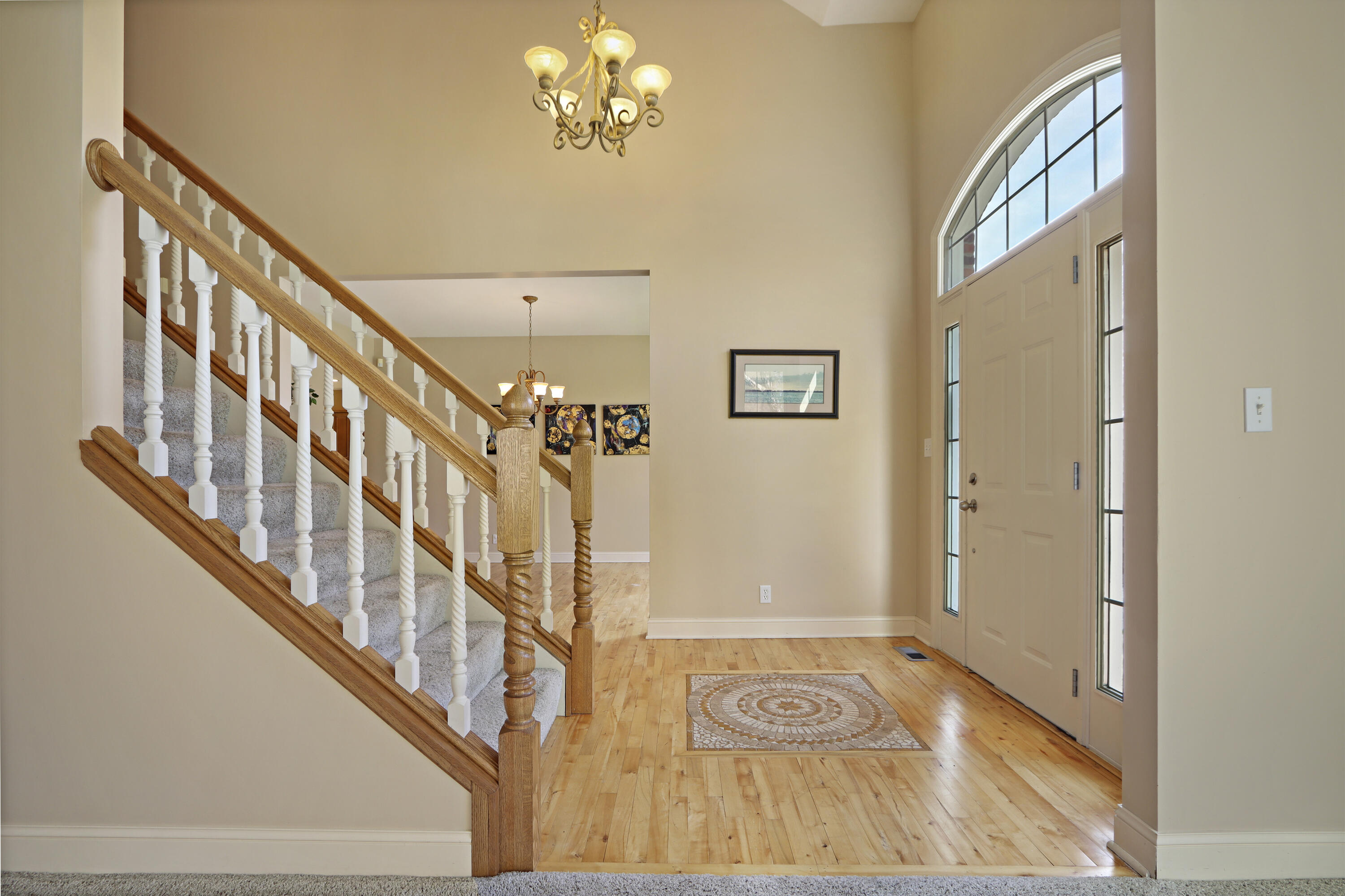 392 County Road B Fontana, WI 53125 - Photo 5 of 75 Welcome your friends and family in to your home in style through the Front Entry Foyer with tile inset