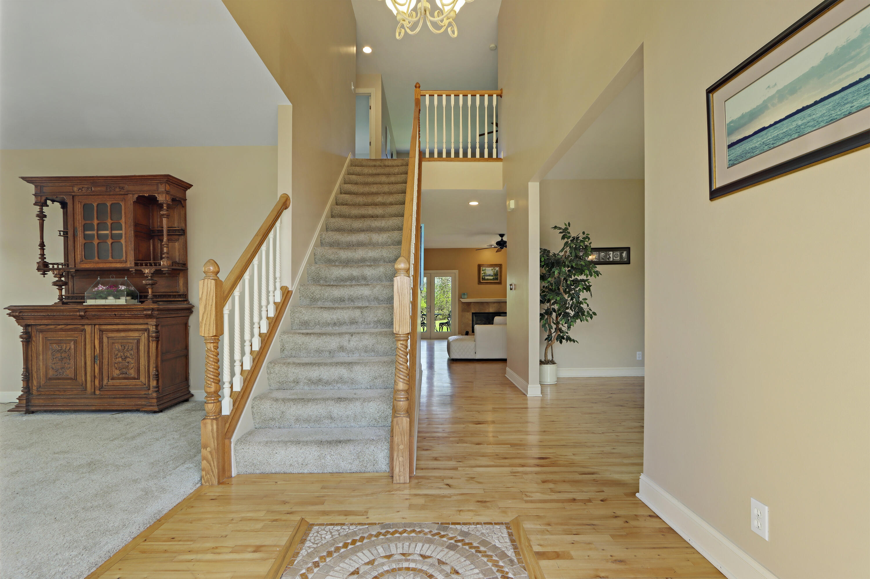 392 County Road B Fontana, WI 53125 - Photo 6 of 75 The Front Entry opens into the Formal Living Room, Formal Dining Room and down the hallway to the Great Room
