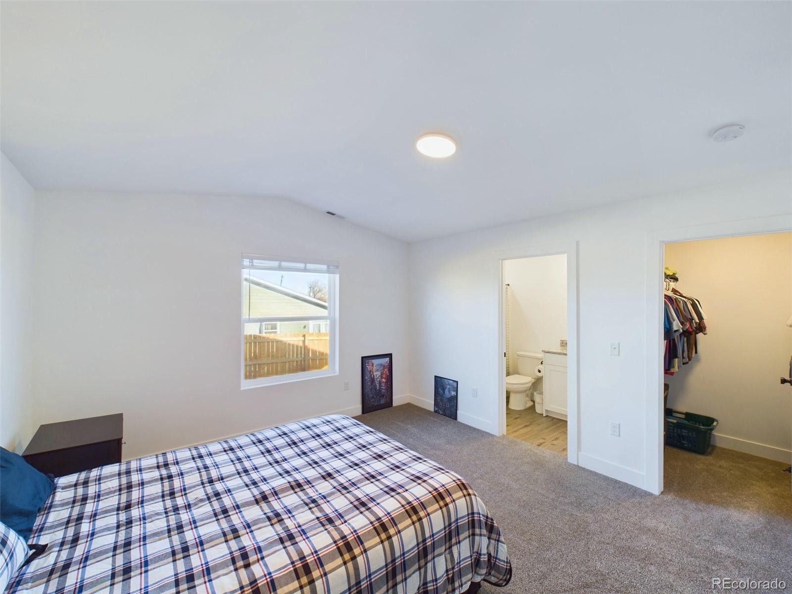 1439 Brewery Road Pueblo, CO 81001 - Photo 10 of 25 a bedroom with a bed and a closet