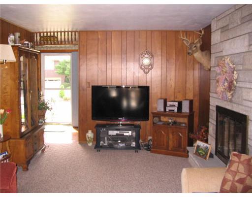 320 Nichols Road Pittsburgh, PA 15237 - Photo 7 of 18 Family Room. Nice family room with stone fireplace and sliding glass doors to rear coverd deck overlooking pool and wooded back yard.