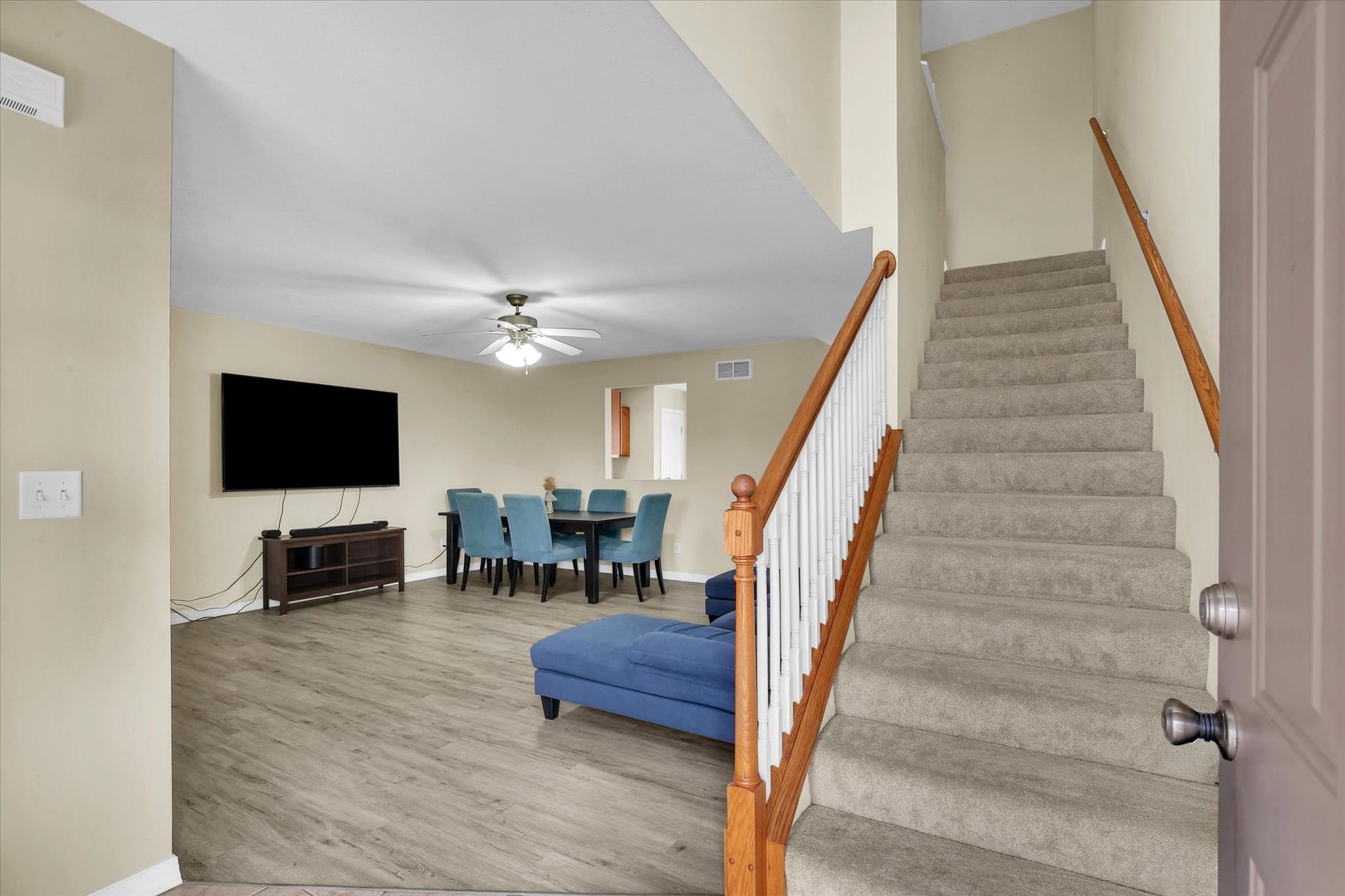 3715 Boulder Ridge Drive Champaign, IL 61822 - Photo 4 of 29 a living room with furniture and a flat screen tv
