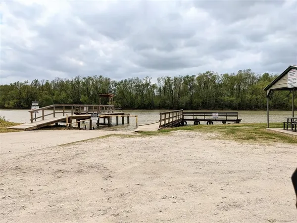 a view of swimming pool with a yard
