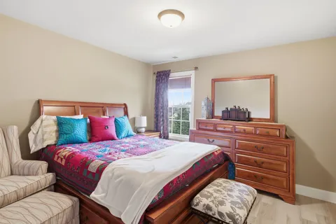 a view of workspace with furniture and window