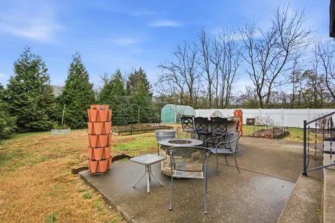 a house with swimming pool in front of it