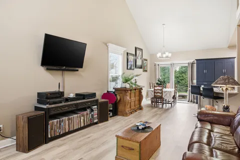 a kitchen with a sink cabinets and window