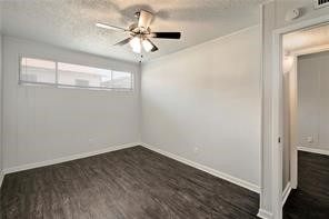 2900 Cole Street, Unit 307 Austin, TX 78705 - Photo 17 of 20 a view of a big room with wooden floor