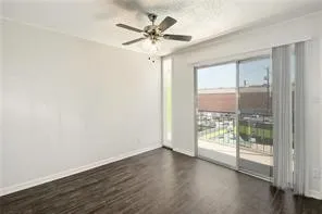 a kitchen with granite countertop a refrigerator and a stove