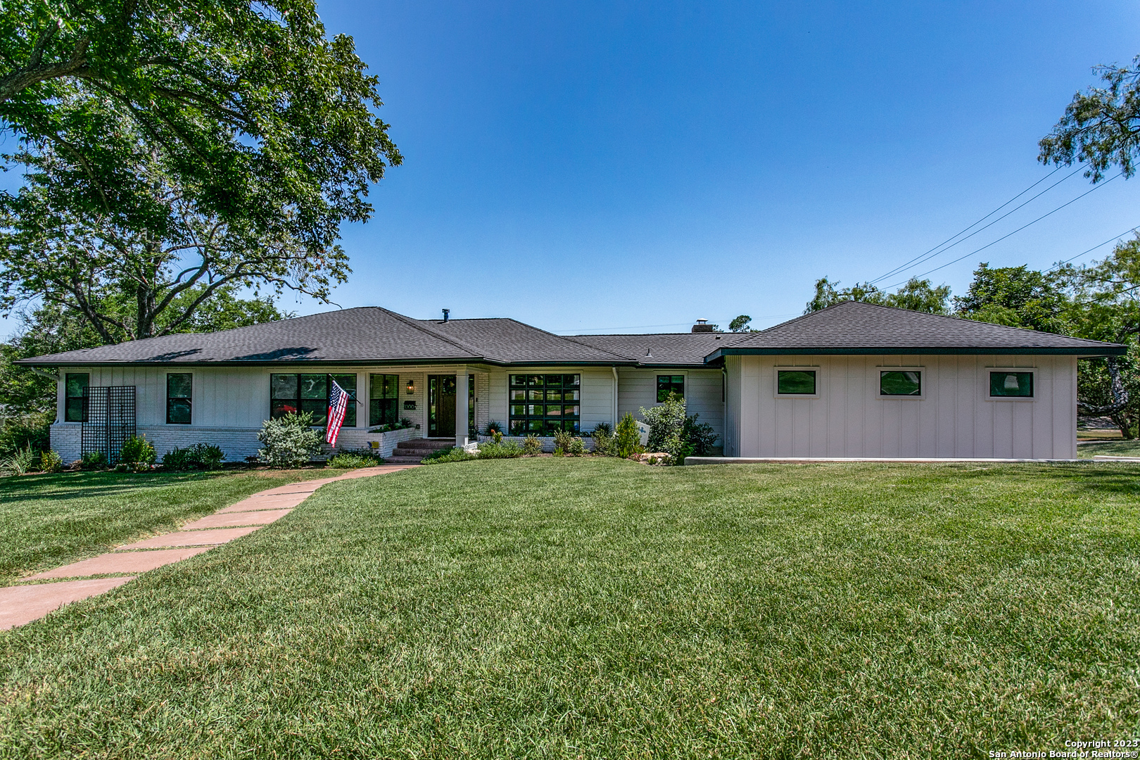 1000 Wiltshire Avenue Terrell Hills, TX 78209 - Photo 1 of 1 a front view of a house with a garden