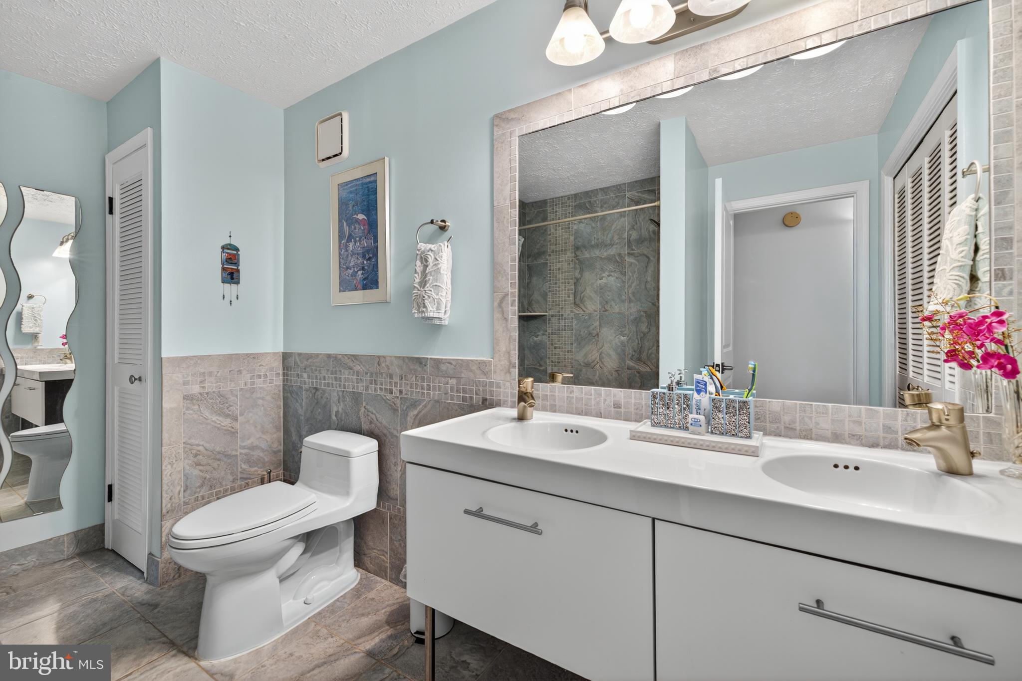 910 Windbrooke Drive, Unit 910 Gaithersburg, MD 20879 - Photo 16 of 20 Serene bathroom with modern elegance.