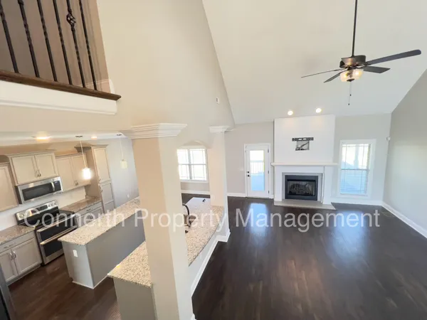 a living room with a fireplace