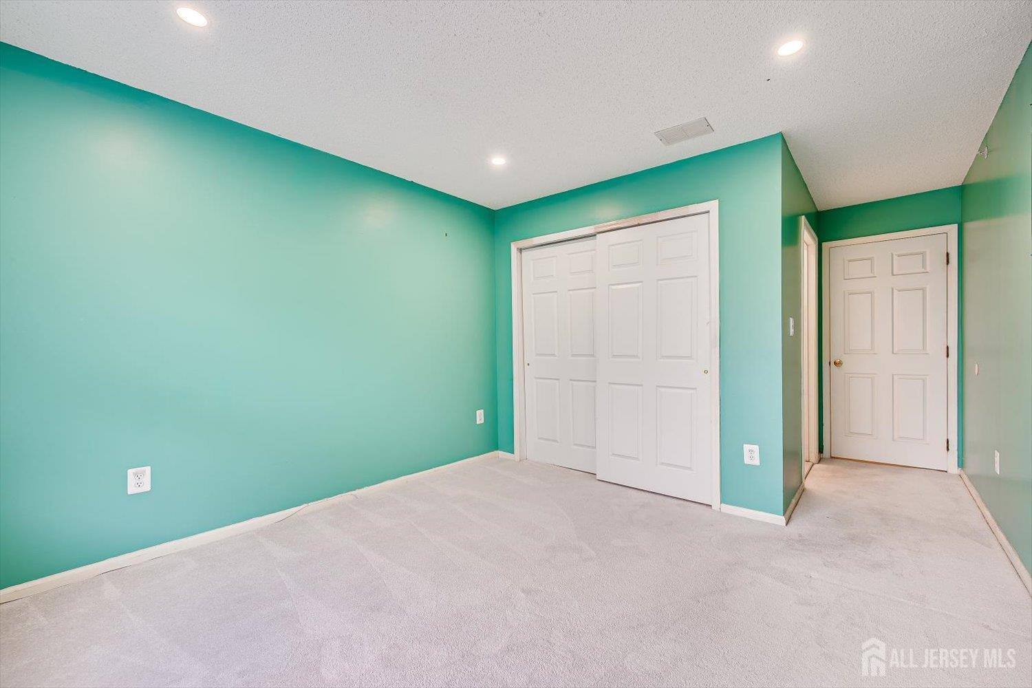 10 Guisborough Way Edison, NJ 08820 - Photo 25 of 27 an empty room with closet