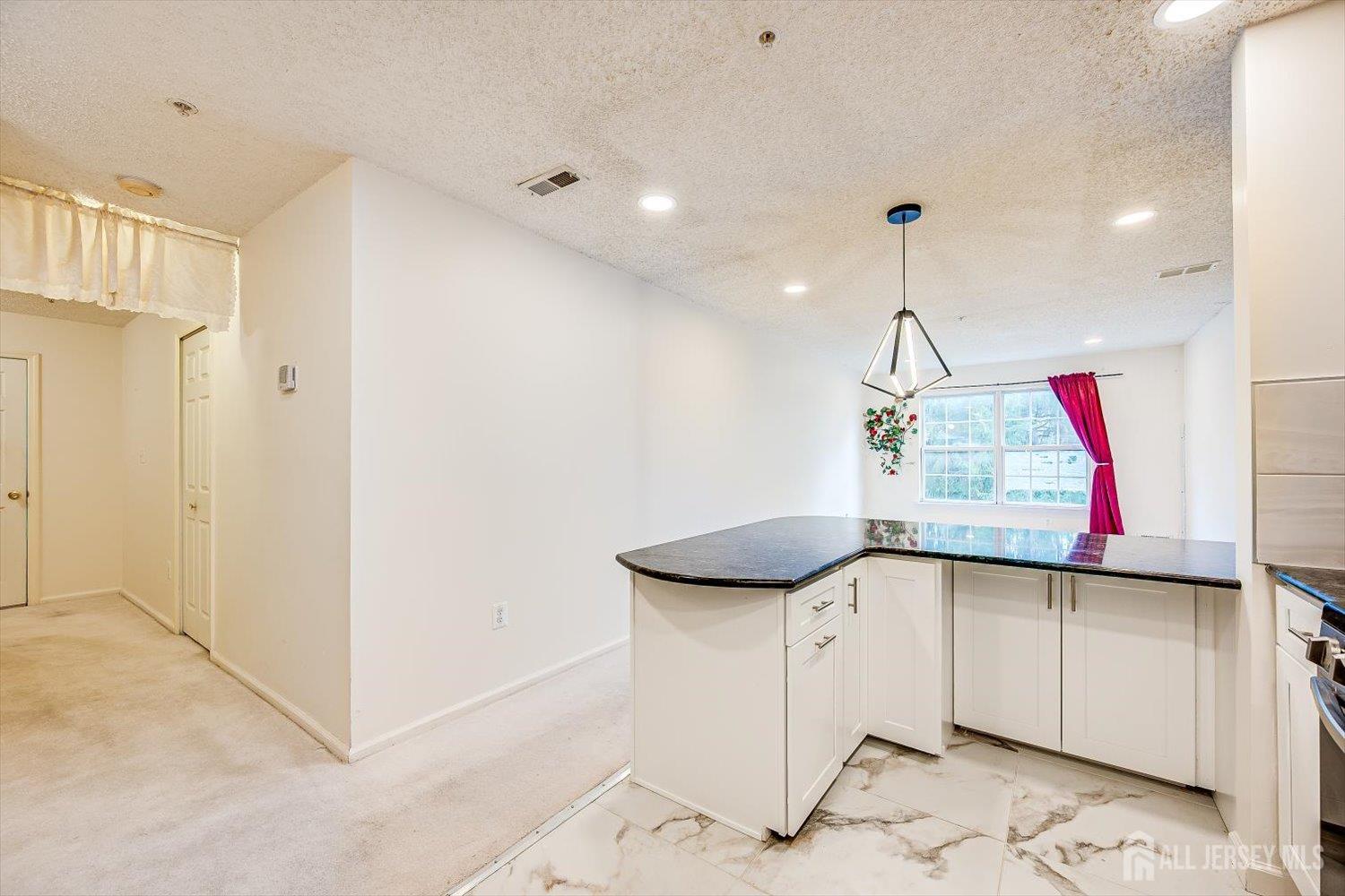 10 Guisborough Way Edison, NJ 08820 - Photo 8 of 27 a view of a hall and an entryway