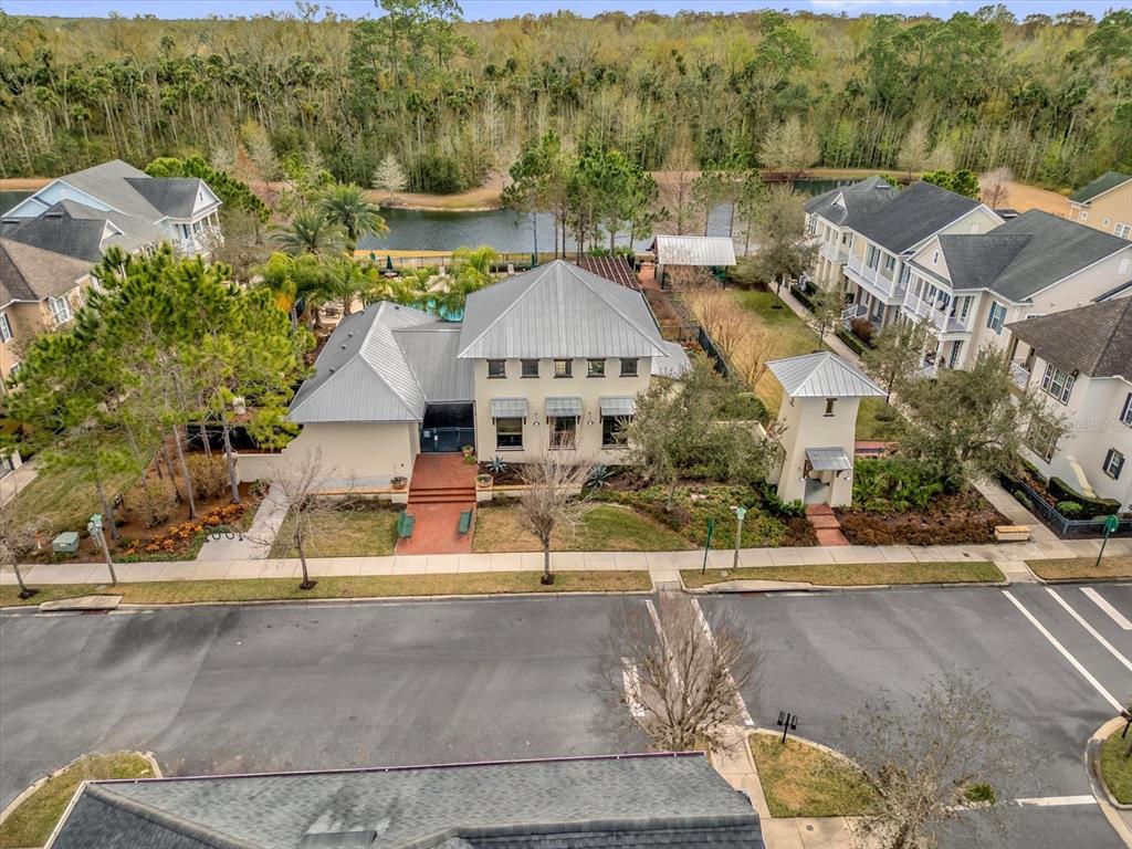 1547 Resolute Street Celebration, FL 34747 - Photo 36 of 40 an aerial view of residential houses with outdoor space and parking