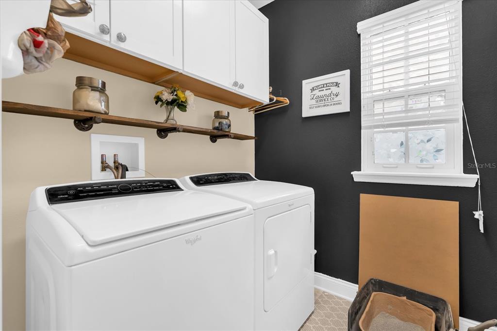 1547 Resolute Street Celebration, FL 34747 - Photo 40 of 40 a utility room with dryer and washer